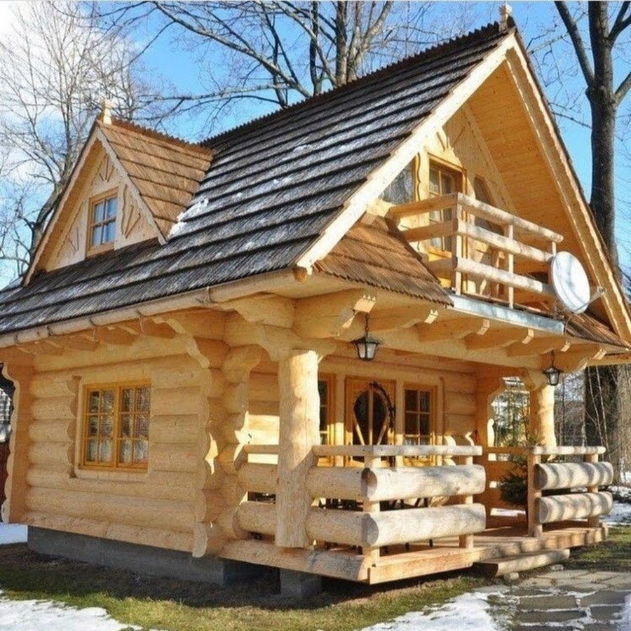 Дом из бревна с террасой