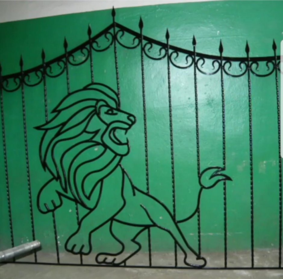 Кованый забор со львами