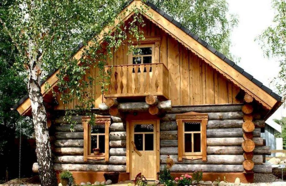 Деревенский домик из бревна