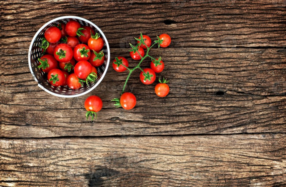 Tomatoes on the Wooden background